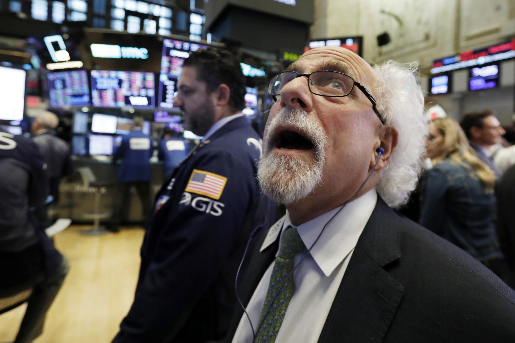 Trader Peter Tuchman works on the floor of the New York Stock Exchange, Wednesday, Oct. 10, 2018. The Dow Jones Industrial Average plunged more than 800 points, its worst drop in eight months, led by sharp declines in technology stocks. (AP Photo/Richard Drew)